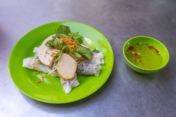 Vietnamese Banh Cuon rice rolls served